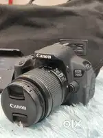 Canon 700d touch screen camera with 18-55 lens battery charger strap