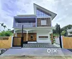 4.5 CENT 2200 SQFT 4BED ROOMS 3CAR PARKING HOME IN ALUVA KADUNGALLUR