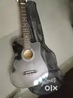 Juarez guitar, very less used with picks and extra strings