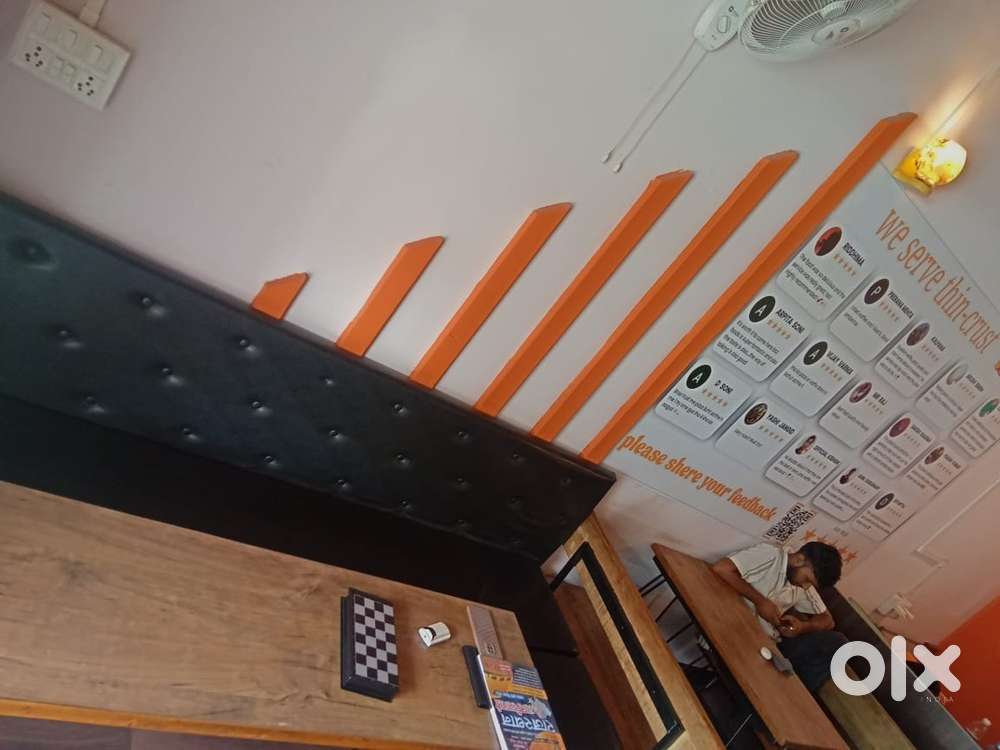 Cafe saman with sitting