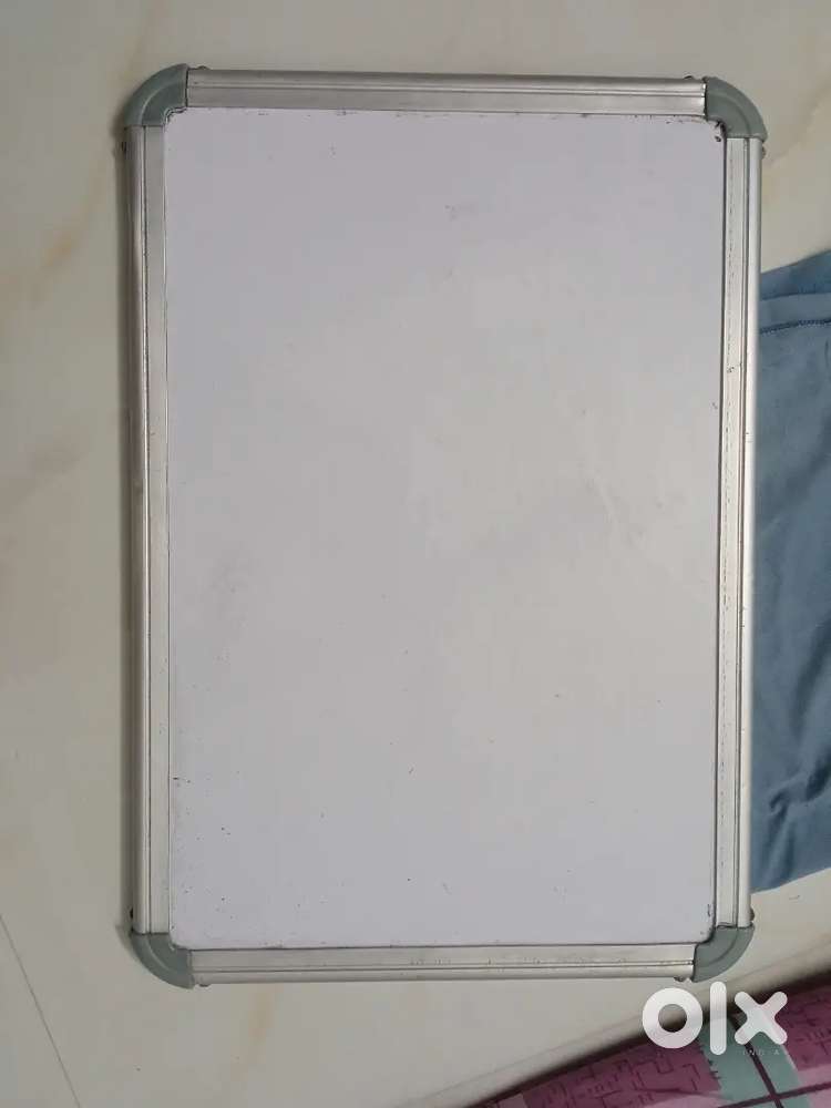 2 White board(1 small, 1 big) and bed Study table