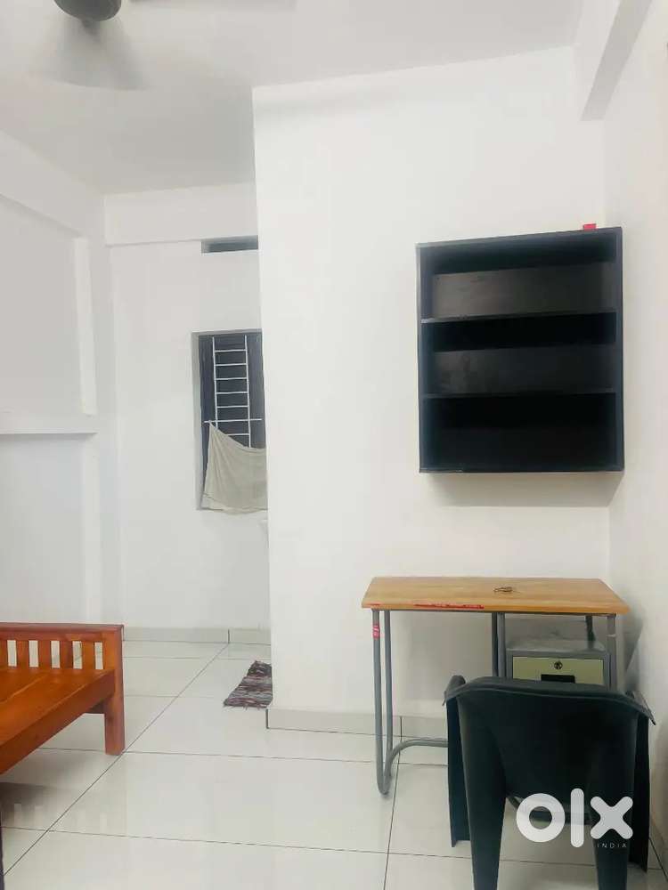 Semi furnished single room bath attached for rent near kakkanad