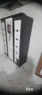 Wardrobe and single storage bad and metras