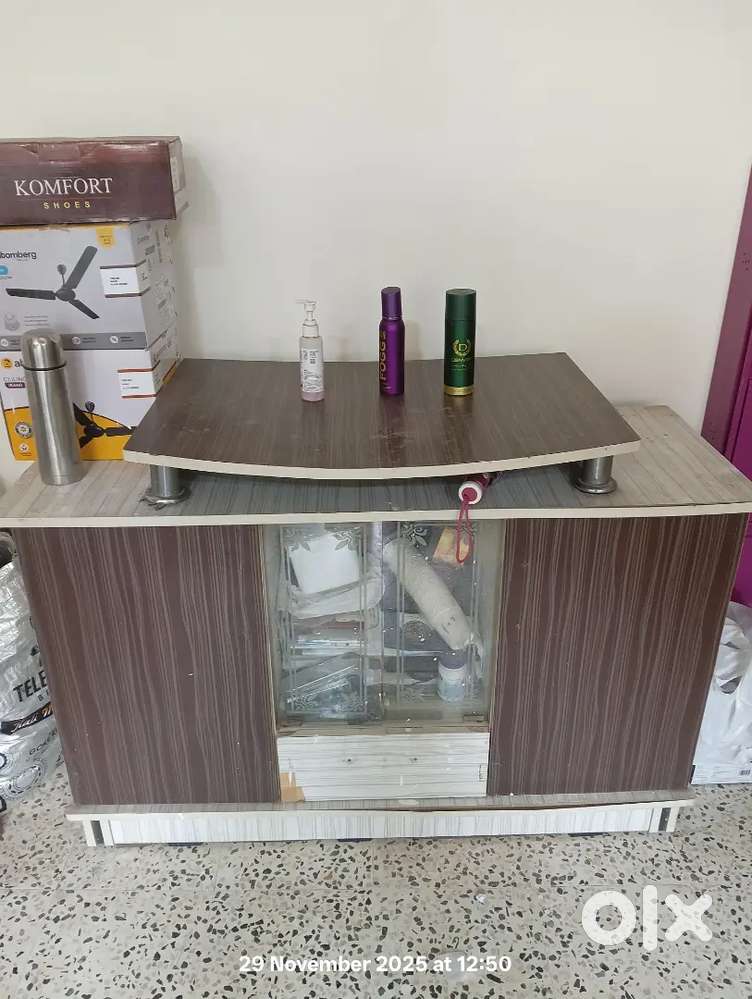 Wooden storage table with glass display
