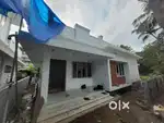 AN ELEGANT NEW 2BED ROOM 1400SQ FT HOUSE IN KOTTEKKAD,THRISSUR