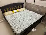 Mildly used king size bed and mattress