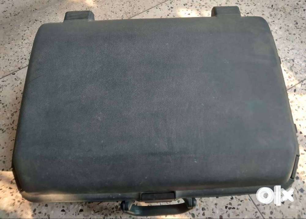 American Tourister suitcase (trolley fitted)