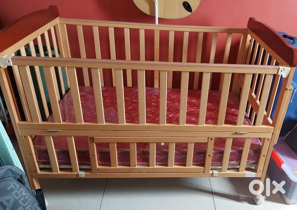 Baby crib along with new mattress