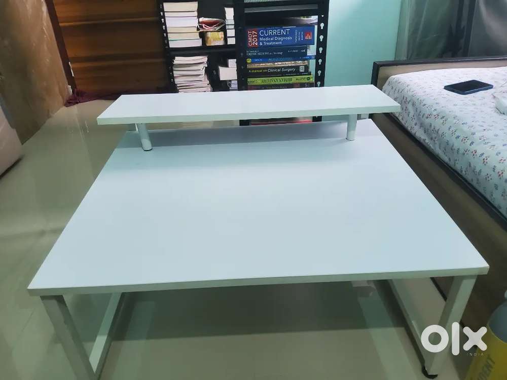 4 months old white color very heavy wooden floor table