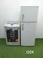 Id.112Whirpool 6.5kg top load washingmachine & godrej 270ltrs d/d frid