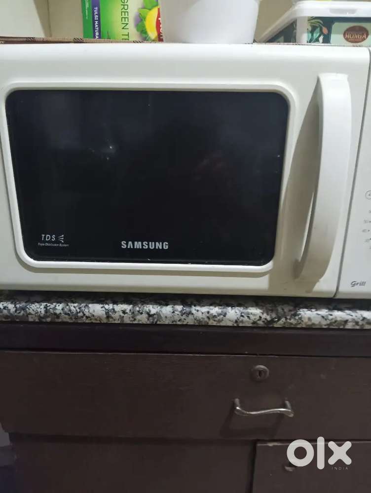 Microwave  running condition urgent sale