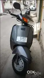 Gray honda activa old metal body