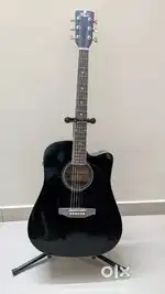 Acoustic  Guitar Sparingly Used