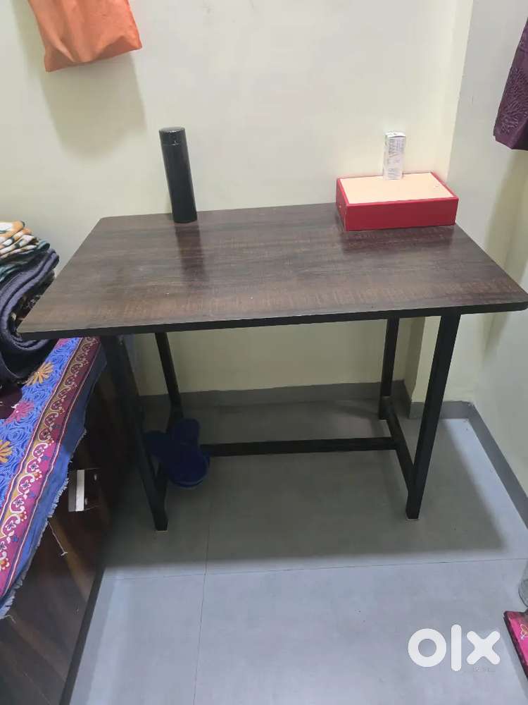 Wooden Table and plastic chair
