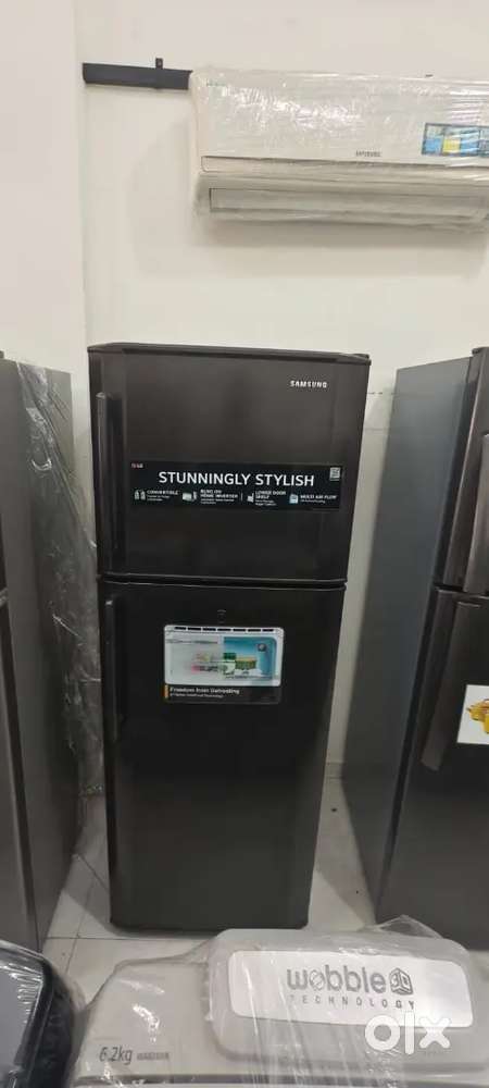 Samsung double door fridge good condition with warranty 1 year old