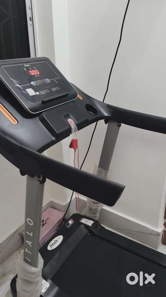 Unused Motorized foldable Treadmill with bill and warranty card
