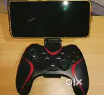 Gaming consoles with phone holder