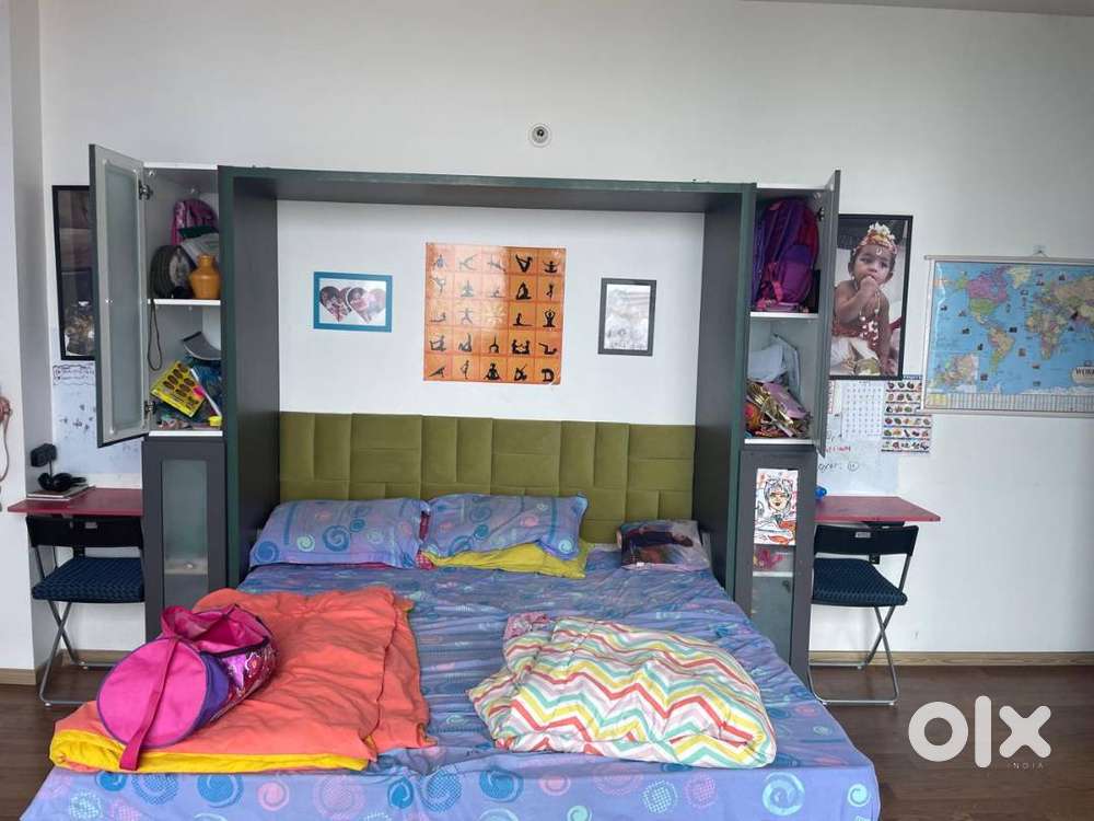 King Size Folding Bed to wall with Book Shelves,  table attached