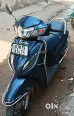 Honda Activa 6g dlx , colour is decent blue metalic.
