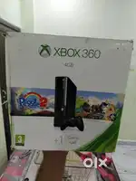 X box 360 ...Unused hai.. condition like new..with adopter