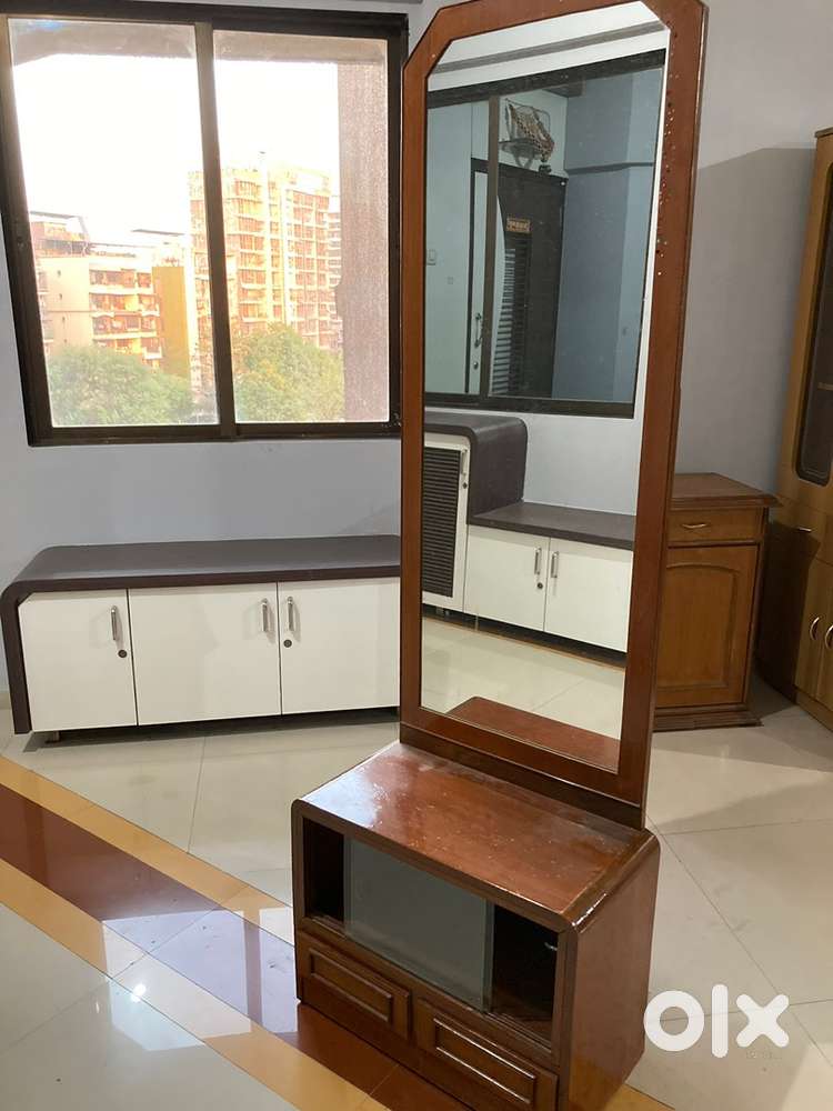 Sofa cum bed and dressing table