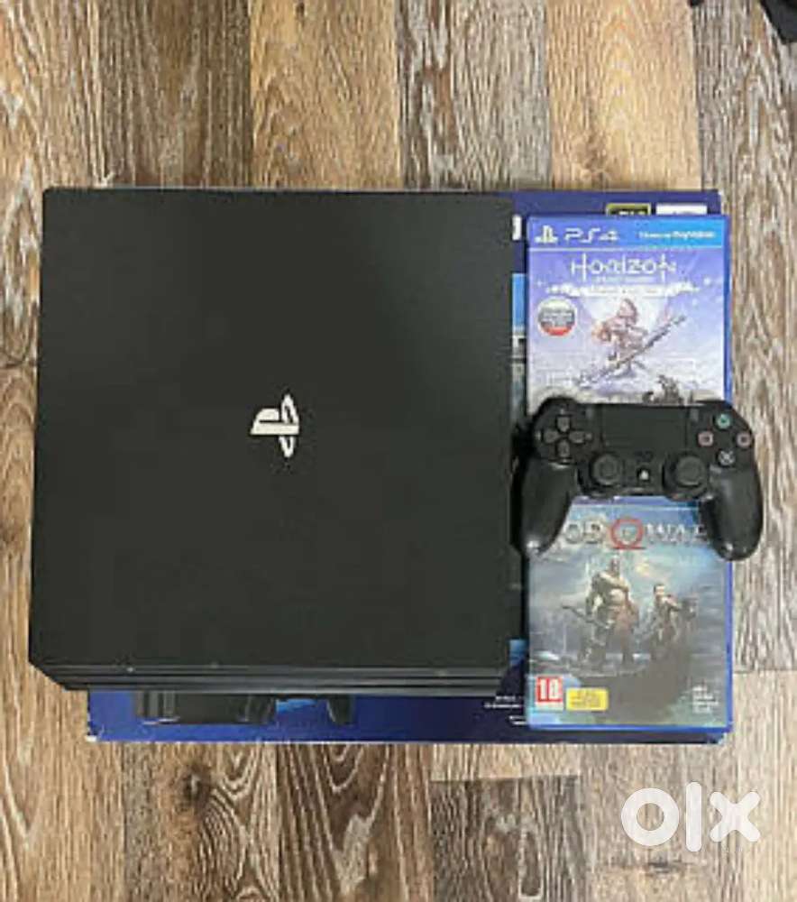 PS4 Pro (1TB) – Excellent Condition  2 Controllers  8 Games Included