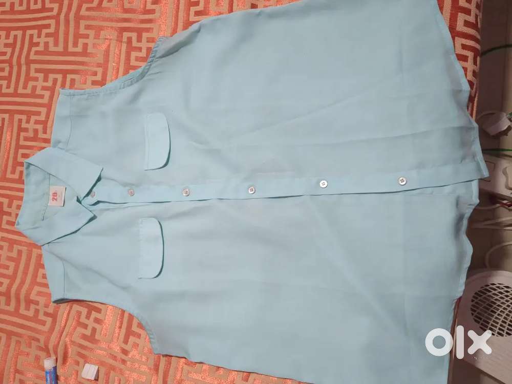 Women clothing. Sleeveless shirt