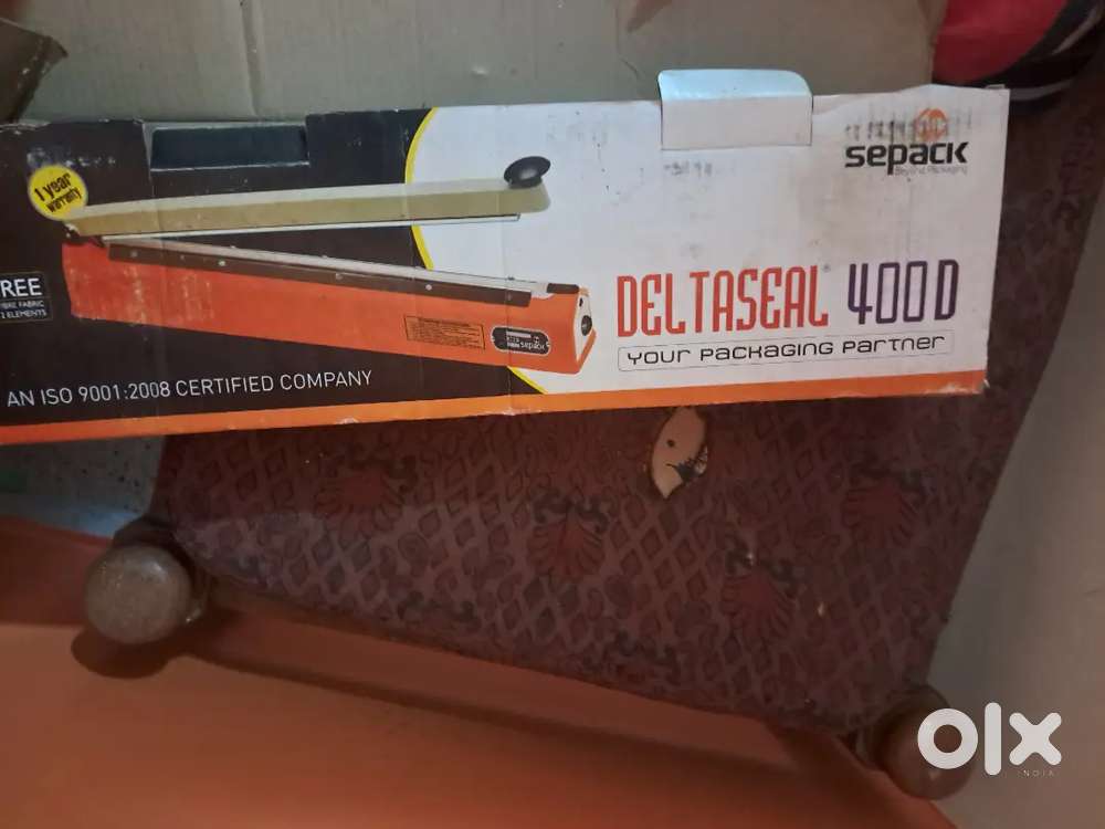 Delta seal 400D, plastic cover sealing machine.