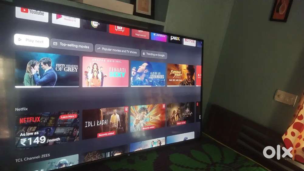 65 inch TCL ANDROID TV EXCHANGE PHONE ,LAP OR CASH