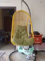 Julian sitting with stand