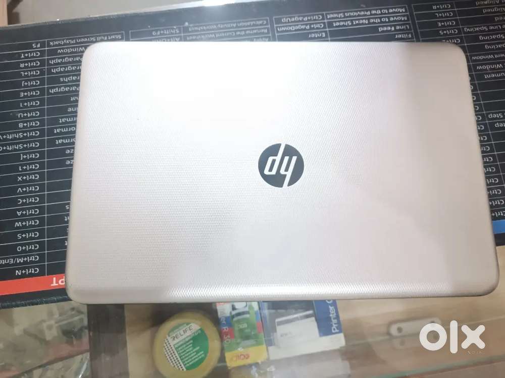 HP LAPTOP BLACK AND SELVER  I3 5th gen 4GB RAM 1TB HDD  WITH WIN 10