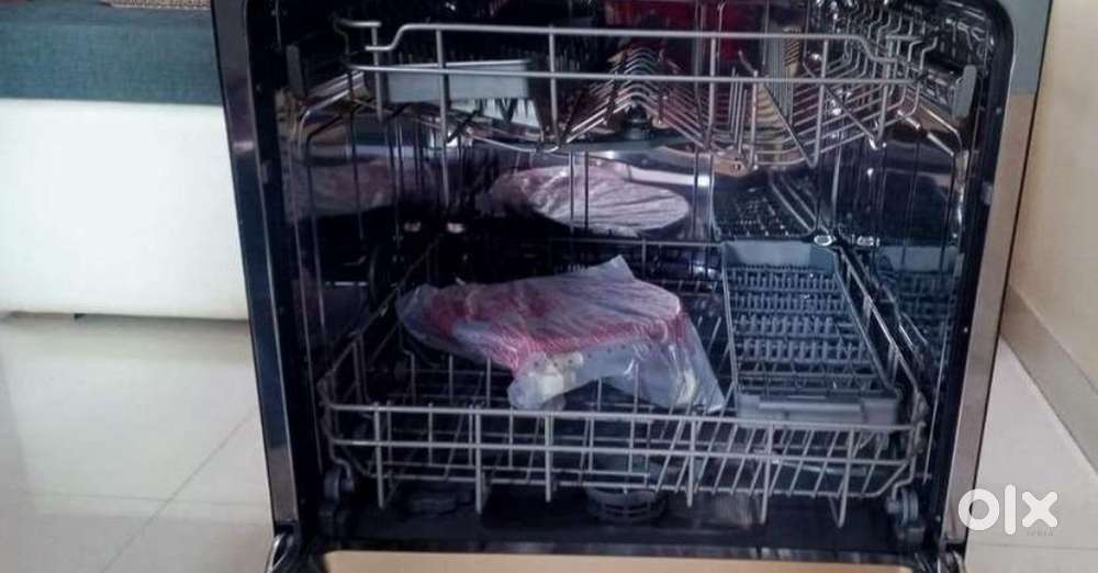 Voltas dishwasher next to new