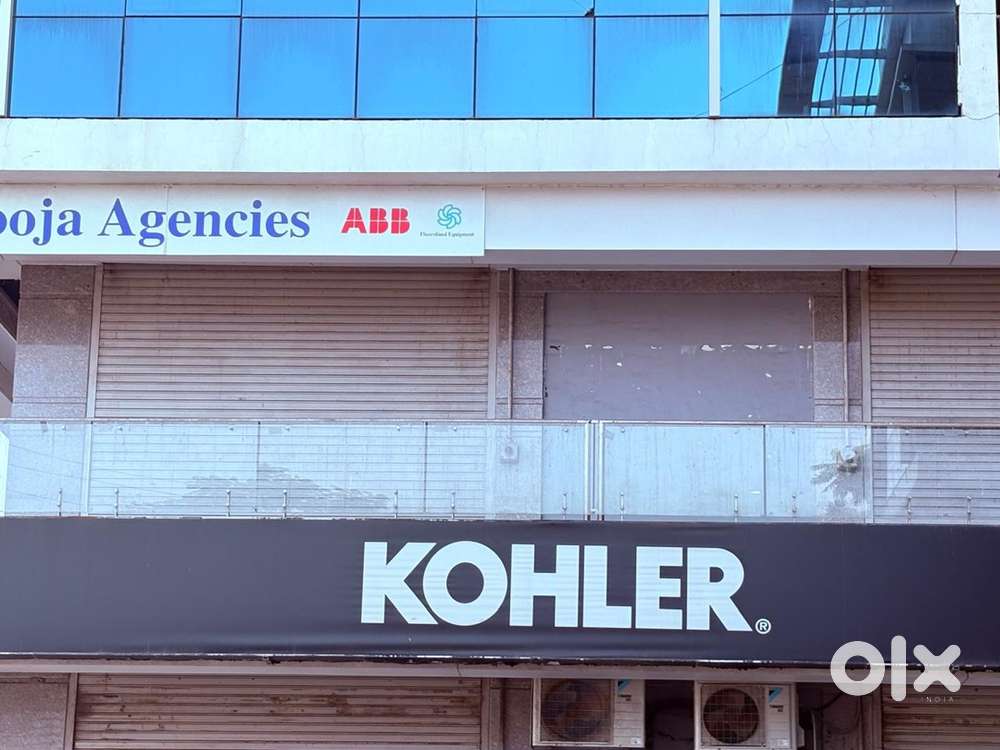 2nd floor office with 3 shutters road side display