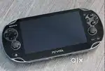 Sony PS Vita (PCH-1104) + Charger + Memory Card – Excellent Condition