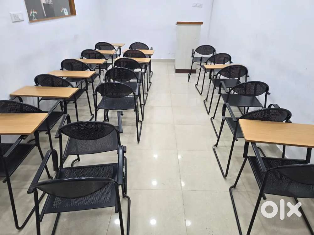 Study chair with writing pad