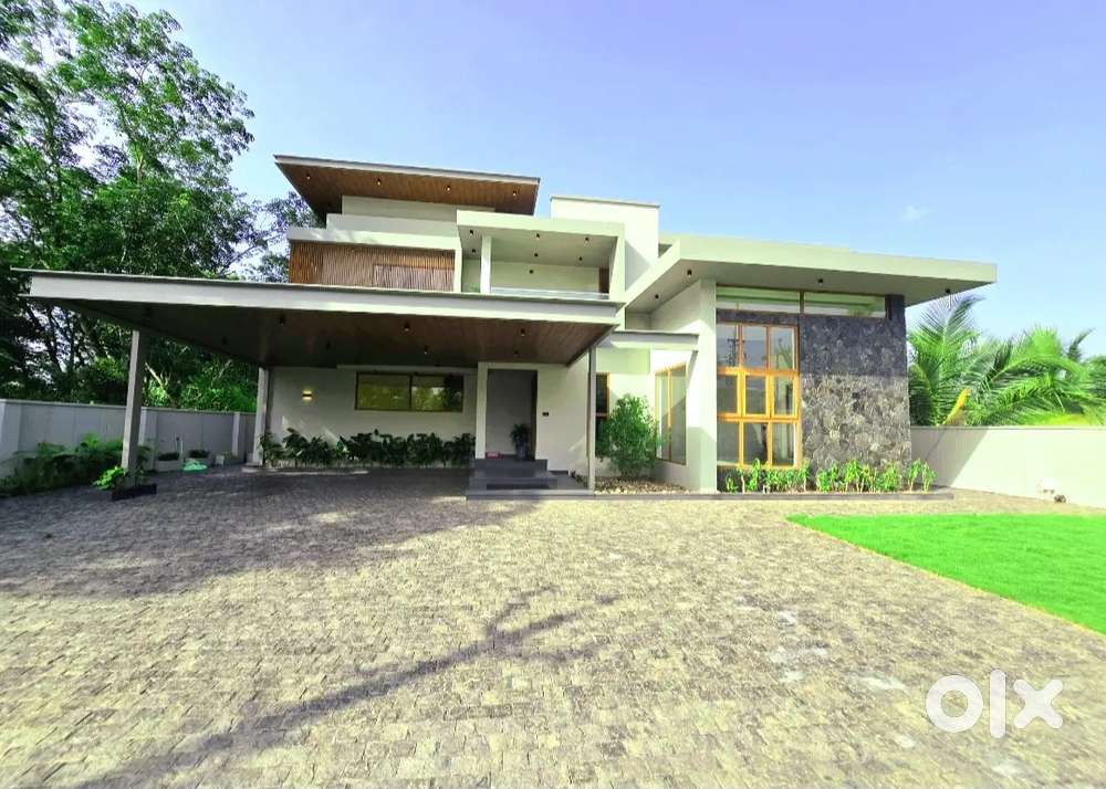 14.6 CENT 4000 SQFT 4BED ROOMS ULTRA PREMIUM HOUSE IN PUKKATTUPADY
