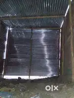 Budget House for sale made up of tin