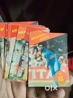 Old cricket cards, pokemon tazos, cricket booklets, jenga cards