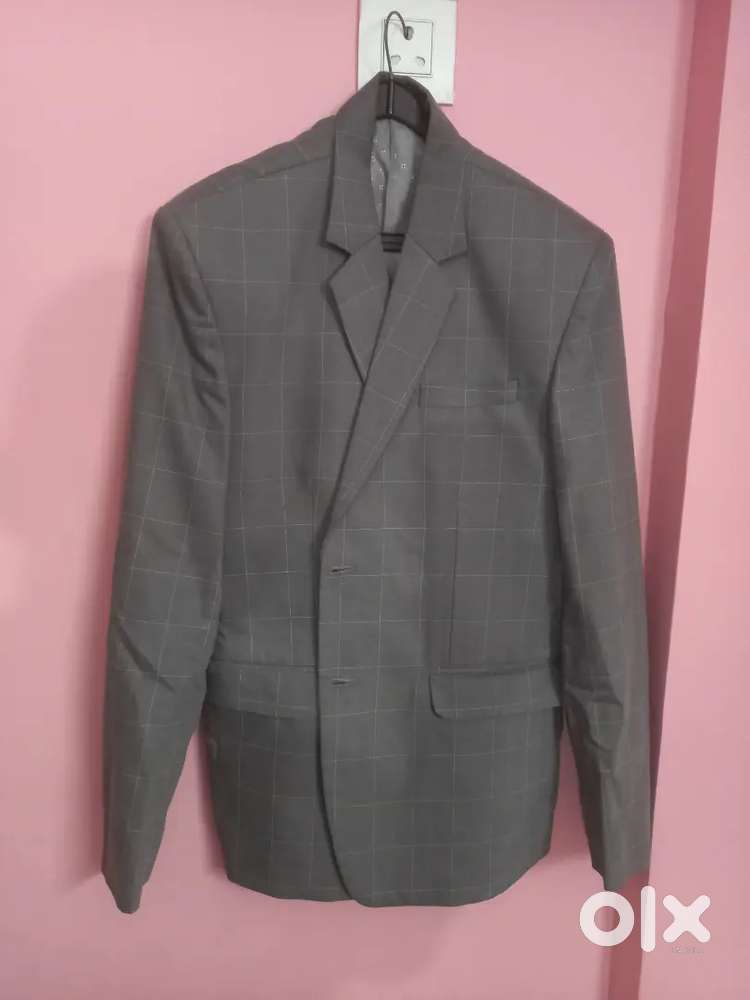 Men's Grey with white lines suit.