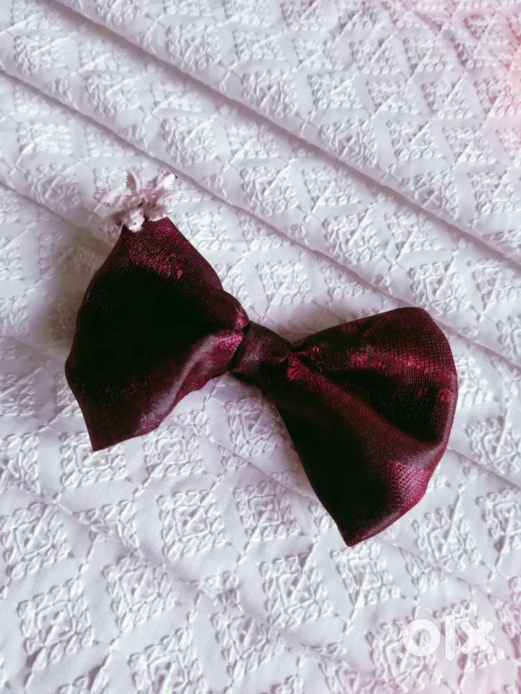Fairy tail bow's in purple and pink color also red hair broch
