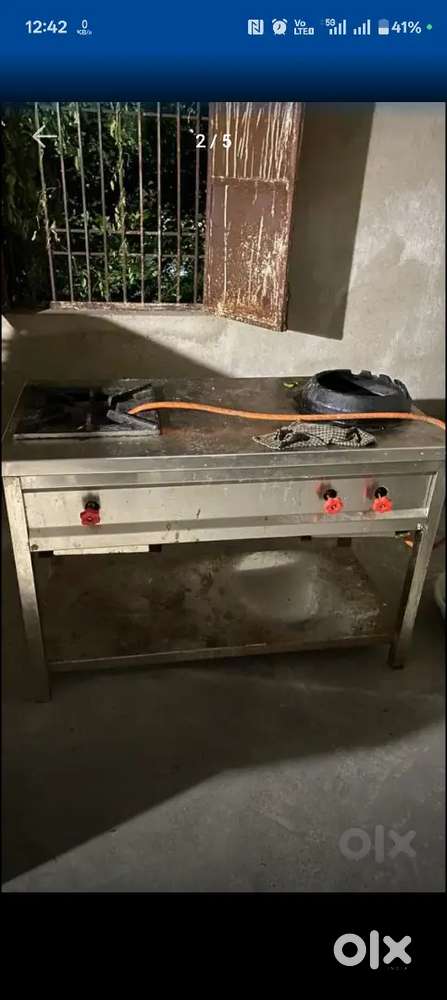 Chullah and 2 SS table and microwave oven