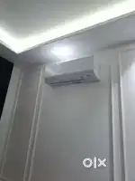 Technician and helper for air conditioning work