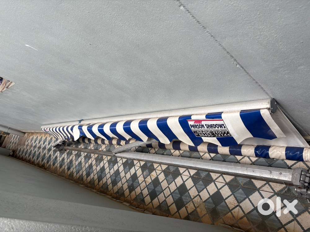 8x11 rolling sunshade for shops :12,000