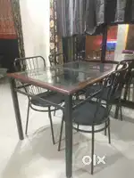 Steel and glass dining table