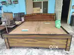 Unused new wooden double bed with box available