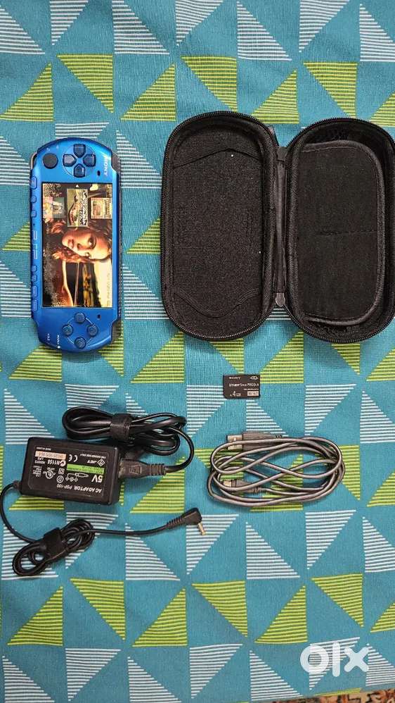 PSP 3004 Slim Rare Metalic Blue Excellent Condition with Games