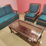 Blue Sofa Set Wooden. Glass centre table.