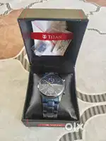 Titan analog watch suits on all outfits shows Day,Date,24hour time