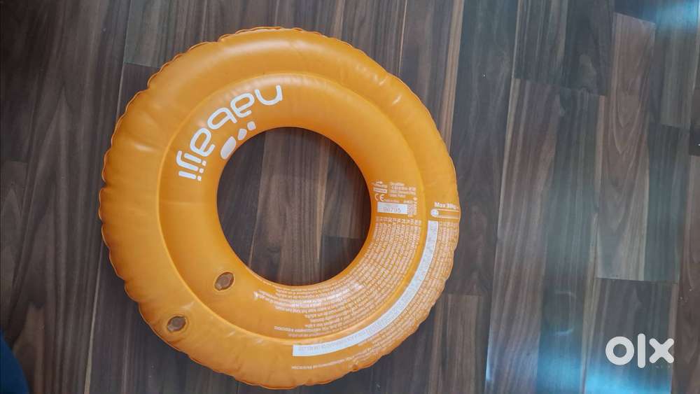 Inflatable swimming float