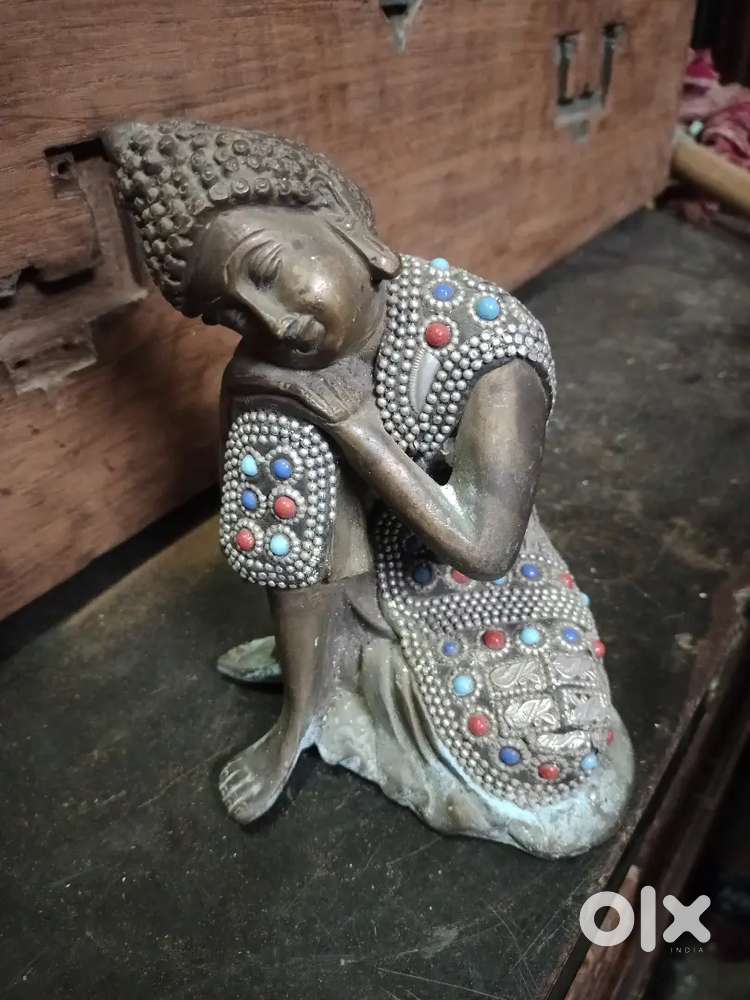 Antique brass buddha statue